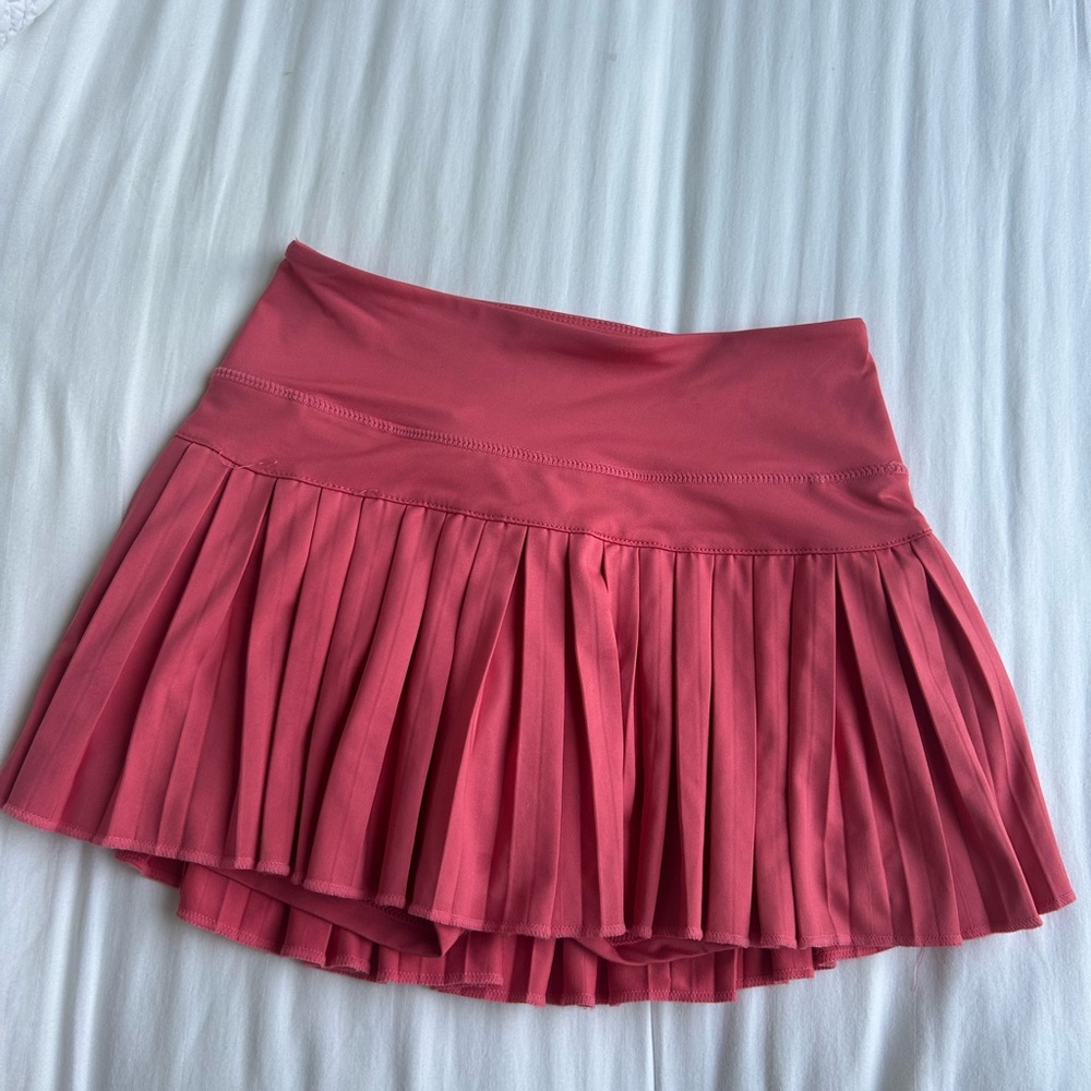 Pleated coral gold hinge skirt!